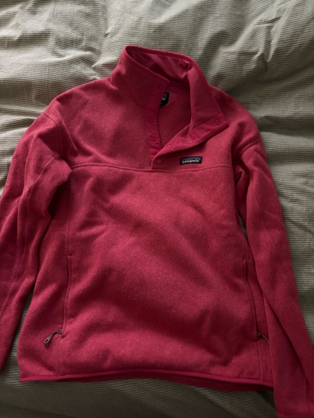Patagonia women's bright pink snap-button fleece jacket